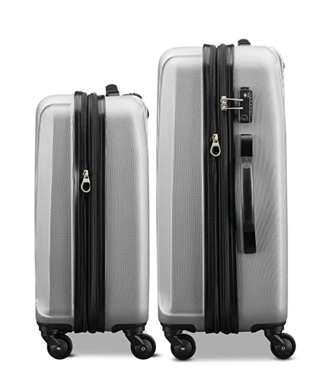 a pair of luggage with wheels