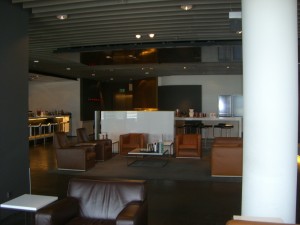 a room with brown leather furniture