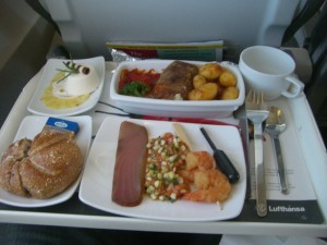 a tray of food on a plane