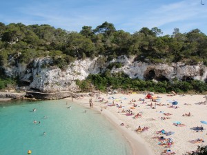 a beach with people on it