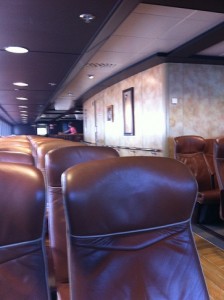 a row of brown leather chairs