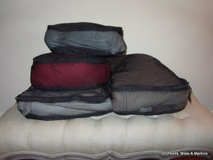 a stack of different colored pillows