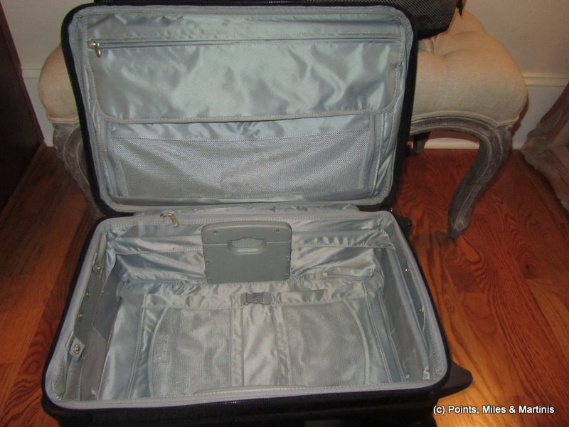 a suitcase with a lid open