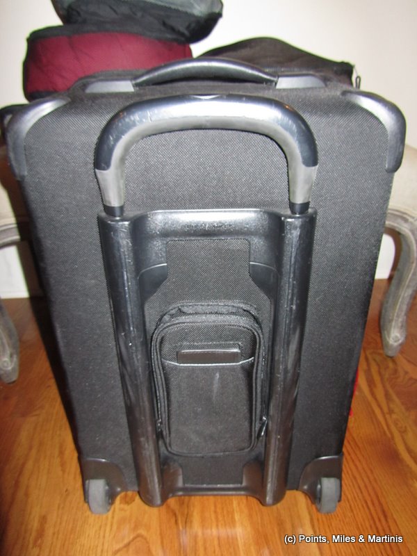 a black suitcase with silver handles