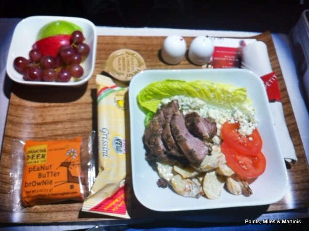 a tray with food and snacks on it