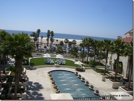 a pool with water in the middle of a resort