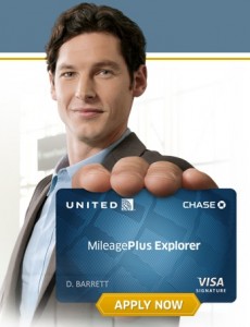 a man holding up a credit card