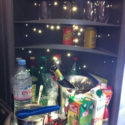 a shelf with drinks and beverages