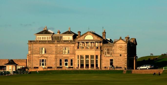 a large building with a lawn