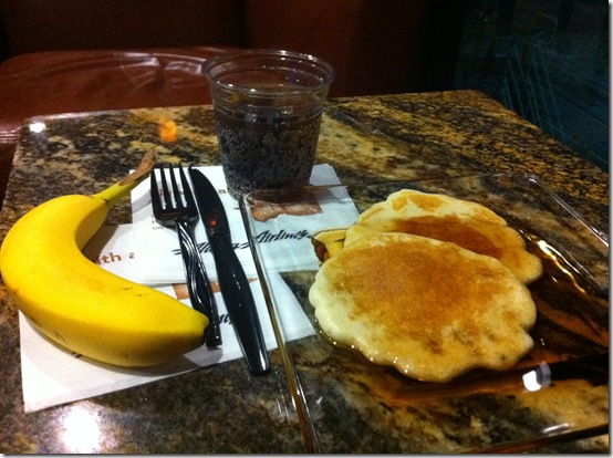 pancakes and banana on a plate