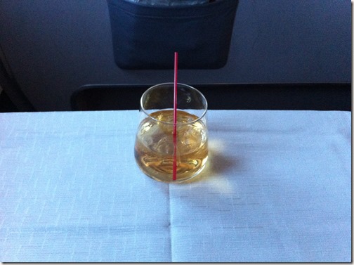 Delta First Class Woodford Reserve on Table
