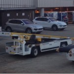 a tow truck parked in a parking lot