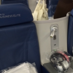a seat with a keyhole and a bag in it