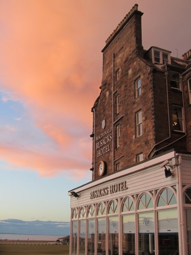 a building with a clock on the side