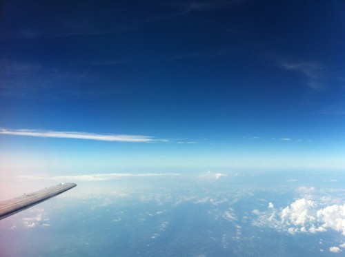 an airplane wing in the sky