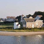 a house on the shore of a lake