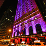 a building with purple lights