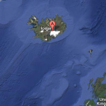 a map of iceland with a red point