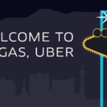 a sign with a star and a city in the background