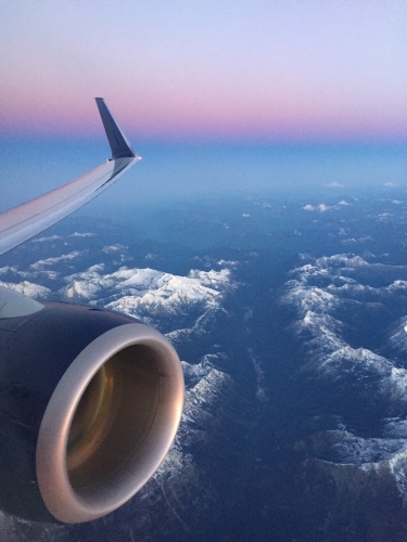 an airplane wing and the sky