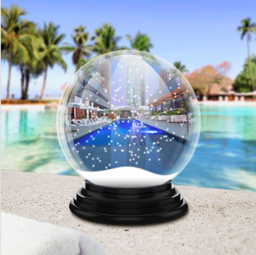 a snow globe with a pool in the background