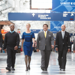 a group of people walking in a building