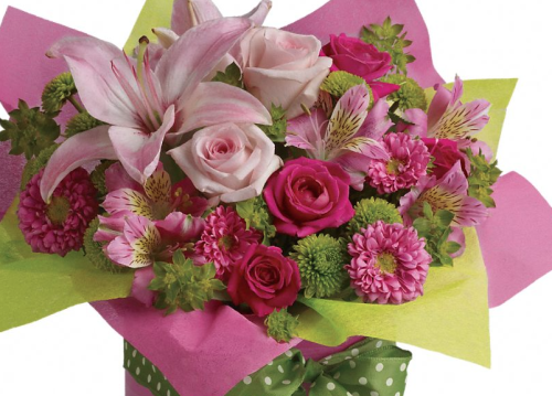 a bouquet of flowers in a box
