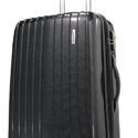 a black suitcase with long handle