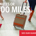 a woman pulling a suitcase