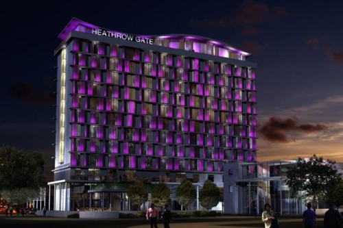 a large building with purple lights