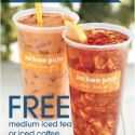 a couple of plastic cups of iced tea