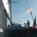 a group of people on a sailboat