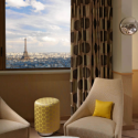 a room with a view of the eiffel tower