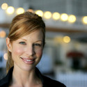 a close-up of a woman smiling