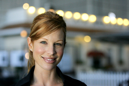 a close-up of a woman smiling