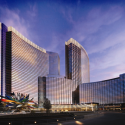 a large building with a large sculpture with Aria Resort and Casino in the background