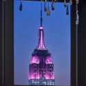 a building with pink lights