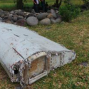 a broken boat on the ground