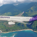 a plane flying over a tropical island