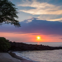 a sunset over a beach