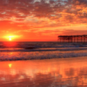 a sunset over a beach