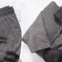 a grey and black sportswear