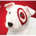 a white dog with a red target on its face