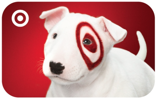 a white dog with a red target on its face
