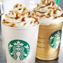 two cups of coffee with whipped cream and caramel topping