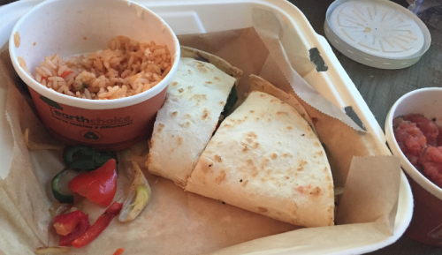 a burrito and rice in a container