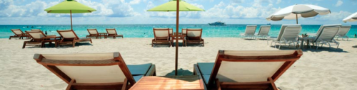 a beach chair and umbrella on a beach