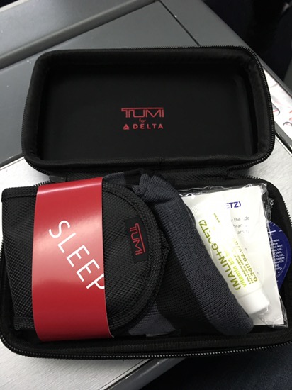 a black case with a red label and a black bag with a red label