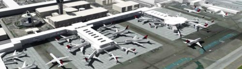 aerial view of airplanes at an airport