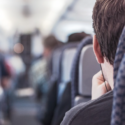 a man sitting in an airplane